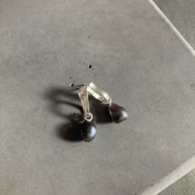 Drop and swinging pearl - silver earrings with black freshwater pearls - designer jewelry
