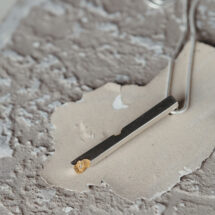 Absence - elongated silver necklace with gold-plated section and diamond - designer jewelry - MADE TO ORDER