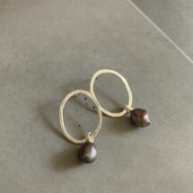 Swinging pearl - amorphous shaped silver earring with large moving black pearl - designer jewelry
